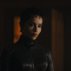 Selina Kyle in a dark room.